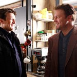 Nathan Fillion and Adam Baldwin on the set of Castle