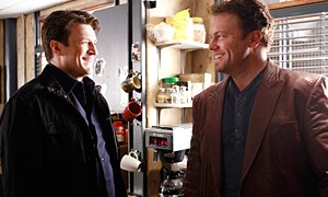 Nathan Fillion and Adam Baldwin on the set of Castle